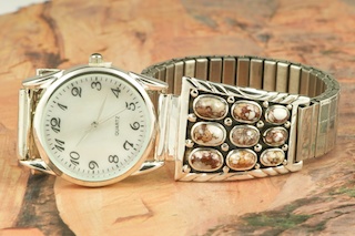 Genuine Wildhorse set in Sterling Silver Watch Tip with an expandable Band. This stone also known as Crazy Horse is mined near Globe, Arizona. Created by a member of the Navajo Tribe.